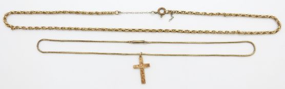 Victorian 9ct gold cross (0.6g) and a yellow metal Victorian chain 7.8gm, 22cm drop
