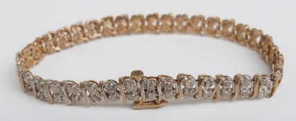 A 9ct gold bracelet set with diamonds, 9.8g