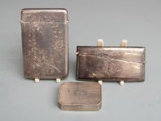 Two hallmarked silver card cases and a snuff box, height 5cm, weight 29g