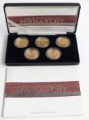 Cased set of five Royal Mint gold plated silver proof crown sized coins commemorating the History of