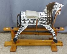 A child's rocking horse, W110 x H67cm
