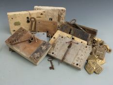 A collection of antique locks and horse brassware