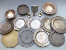 Quantity of 18th and 19thC pewter plates, most with touch marks and one impressed Harvey, largest