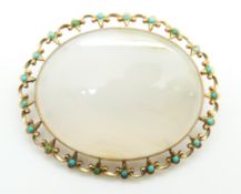 Victorian brooch set with chalcedony within by a gold border set with turquoise, 20.6g, 5.2 x 4.2cm