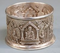 George V hallmarked silver Burmese or Indian style open salt with embossed figures in extensive