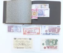 An album containing various UK and overseas banknotes, includes some novelty and replica examples,