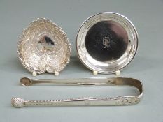 Pair of Georgian hallmarked silver sugar tongs with shell bowls, lion passant and maker's mark