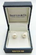A pair of 9ct gold pearl set earrings