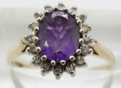A 9ct gold ring set with an amethyst and diamonds, 2.5g, size N
