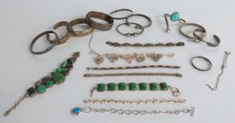 Nine hallmarked silver and white metal bangles and bracelets including amethyst example, further