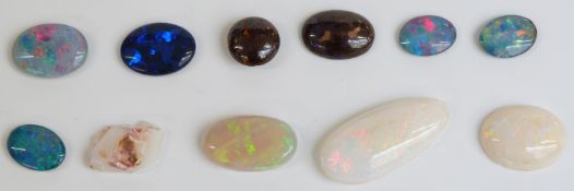 Eleven various opals comprising five triplets, two boulder cabochons and three white examples.