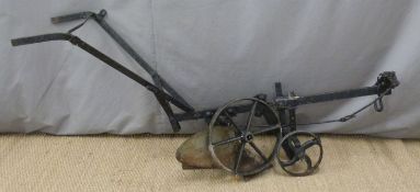 Vintage cast iron horse drawn plough, length 175cm
