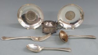 Two white metal pin dishes marked silver, three pieces of hallmarked silver cutlery and a silver