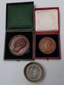 Two large bronze 19thC medal coins one for Queen Victoria, the other for Albert Prince Consort;