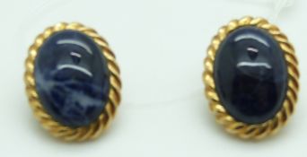 A pair of 18k gold earrings set with sodalite