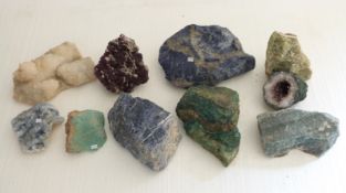Ten various mineral samples including an amethyst geode, quartz etc.
