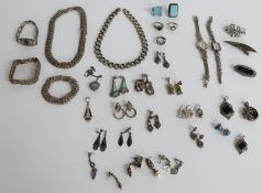 A collection of silver and marcasite jewellery including necklaces, two watches, bracelets,