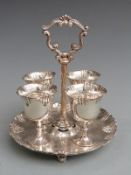 George V hallmarked silver egg stand, Sheffield 1923 maker Martin Hall & Co, egg cups various