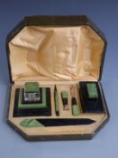 Cased Art Deco black and green marbled plastic desk set, width of case 29cm