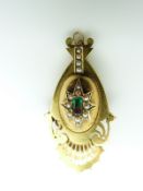 Victorian Etruscan Revival brooch/ pendant set with a foiled emerald surrounded by seed pearls in