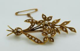 Edwardian 15ct gold brooch set with seed pearls in a bouquet design, 4.5g
