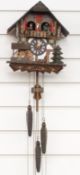 German c1980's musical two train cuckoo clock with automaton feature dancers and water wheel on