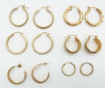 Five pairs of 9ct gold hoop earrings (8.6g) and a pair of 14k gold earrings (4g)
