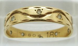 An 18ct gold ring set with paste, 2.4g, size Q