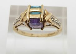 A 9ct gold ring set with an amethyst and blue topaz, 3g, size O