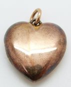 A 15ct gold heart locket, 7.7g