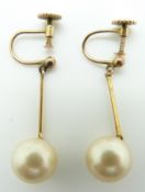 A pair of 9ct gold earrings set with faux pearls