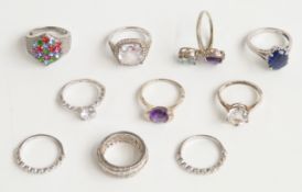 Ten rings including silverexample set with a round cut white sapphire, five silver rings set with