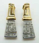 A pair of bi-coloured 14ct gold earrings set with diamonds in a Greek key design, 7.9g