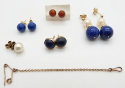 Two pairs of 9ct gold earrings set with lapis lazuli, a pair of earrings set with lapis lazuli and a