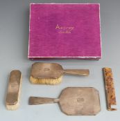 Asprey Art Deco hallmarked silver gilt four piece dressing table set comprising hand mirror, two