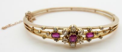 Edwardian 15ct gold bangle set with three rubies measuring approximately 1.2 ct, 0.2 & 0.2ct and old