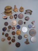Small collection of coins and badges including Elizabeth I hammered sixpence 1582
