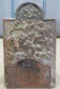 Two cast iron fire backs, height 77cm