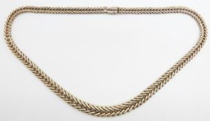 A 9ct gold necklace with graduated  V shaped links, 33.3g, 19cm drop.