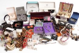 A collection of costume jewellery including earrings, watches, brooches, beads etc