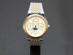 Rotary triple calendar gentleman's wristwatch with inset day and date dials, moonphase, gold Roman