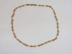 A 9ct gold necklace with figure of eight links, 22cm drop, 6.6g