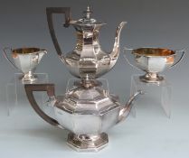 Walker and Hall George V hallmarked silver octagonal four piece teaset, the sugar bowl and milk