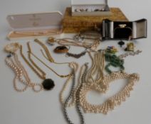 A collection of costume jewellery including brooches, vintage earrings, Lotus pearls etc