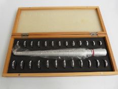 A cased ring sizing set
