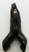A large black coral pendant in the form of two hands praying, found in the Solomon Islands, 7cm