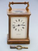 20thC French brass carriage clock. A Jack & Co., Cheltenham  to enamelled Roman dial, blued steel
