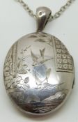Victorian hallmarked silver locket with engraved swallow decoration, Birmingham 1881