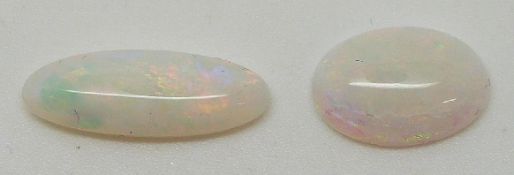 Two oval cut opal cabochons, each approximately 1.7ct
