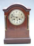 Inlaid mahogany mantel clock, Camerer Cuss and Co, Oxford St. London to silvered Arabic dial, the